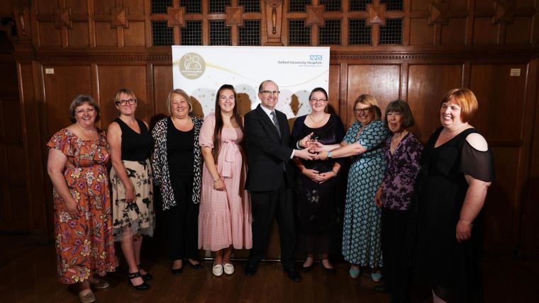 Monkeypox vaccine team receiving their award for delivery
