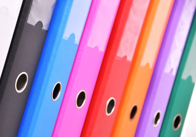 A row of multicoloured folders